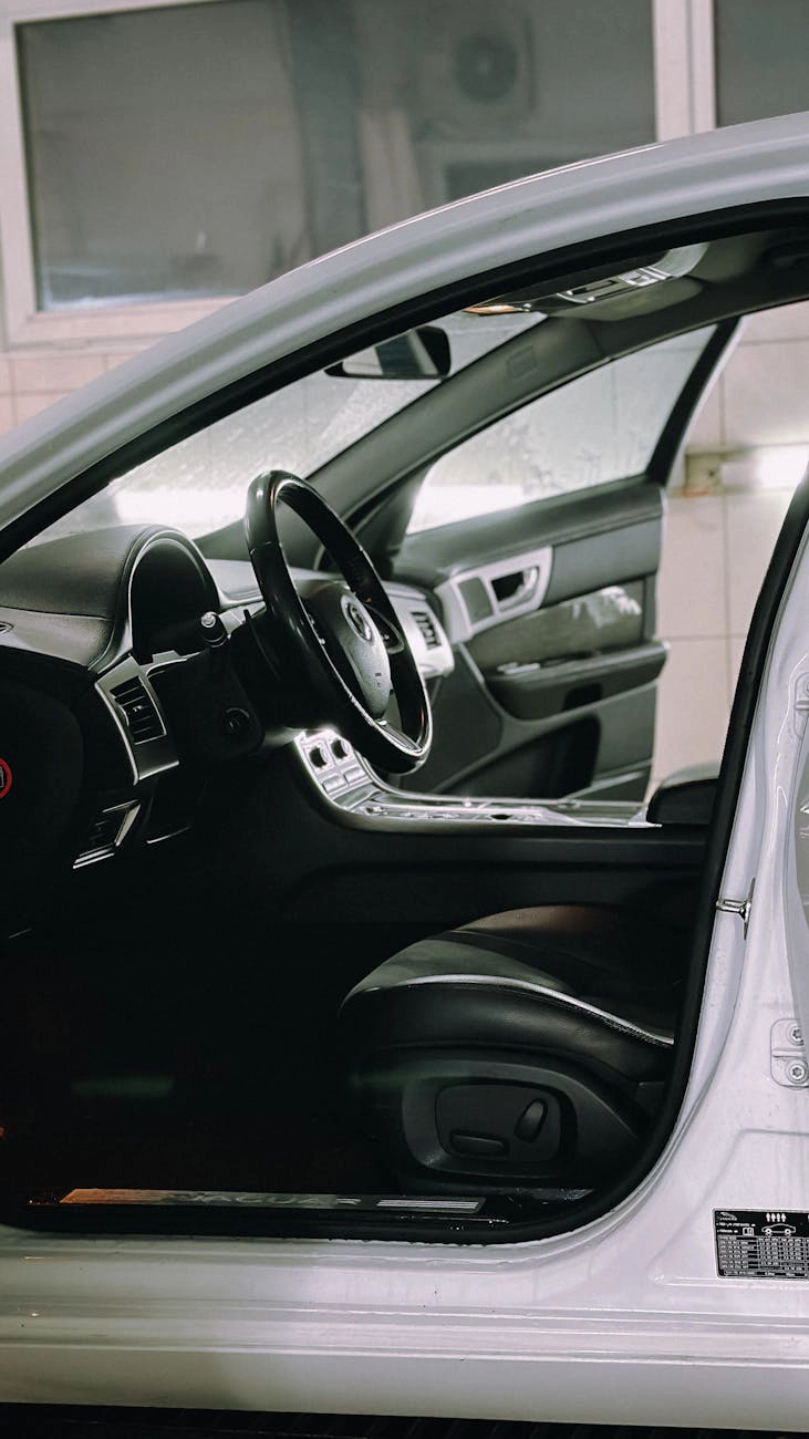 Vehicle door jamb with the tire placard visible.