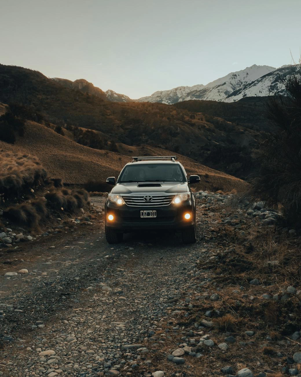 Rugged terrain tire section image.
