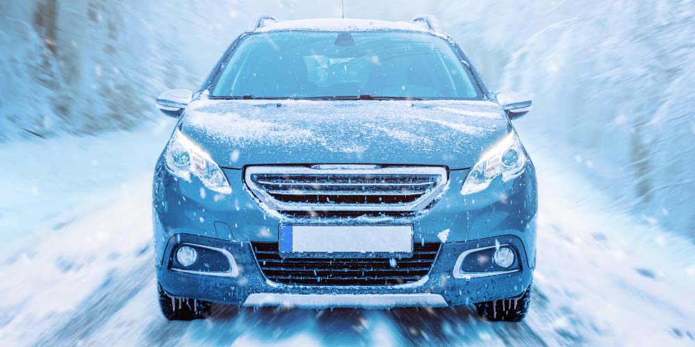 A car being driven in winter