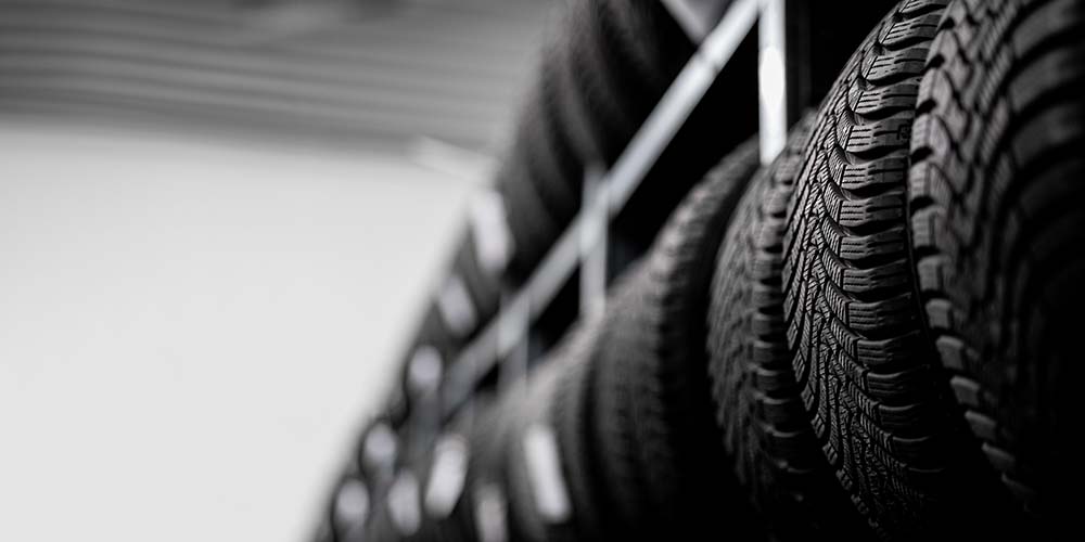 Tires stacked on a tire rack