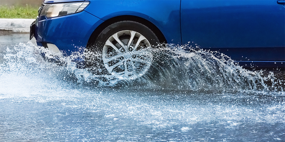Car driving through water