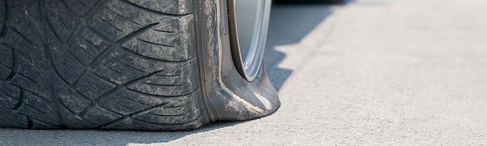 A flat tire on a vehicle