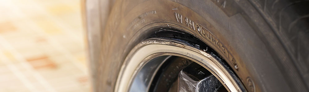 A car damaged by driving on a flat tire