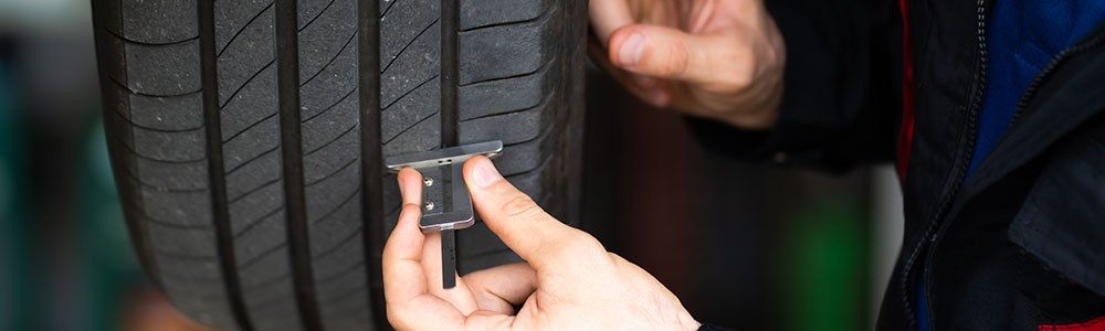 Checking the tread life left on the tires